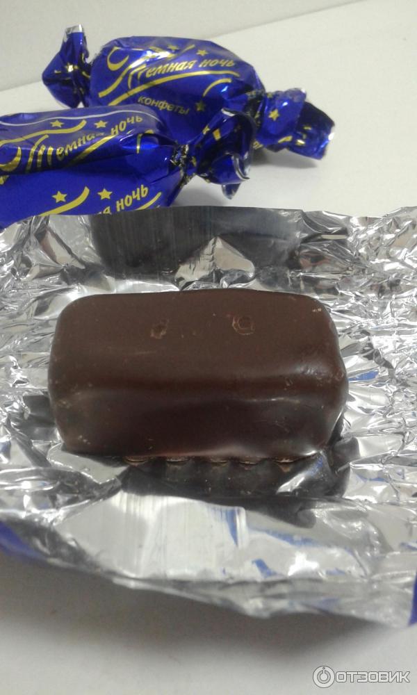 черные конфеты. конфеты шоколадные с темной начинкой. конфеты ассорти славянка люкс. конфеты с салом. шоколадные конфеты с шоколадной начинкой.